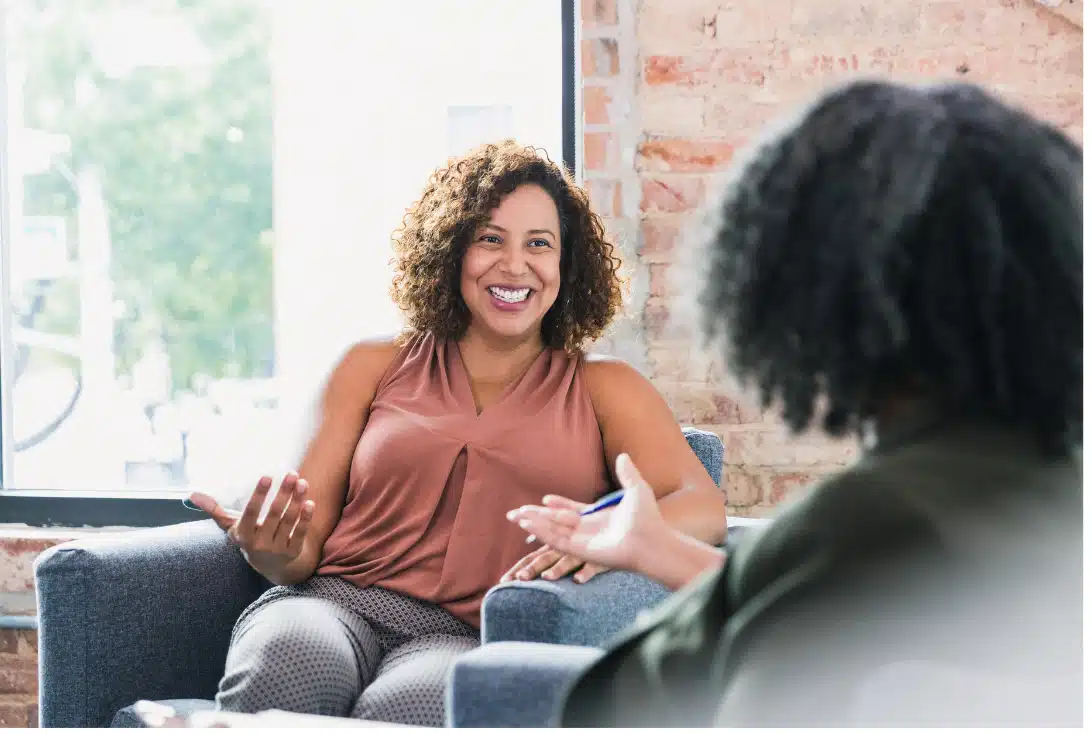 two people talking in coaching session